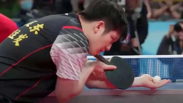 爱游戏2026-中国队险胜日本队，许昕高光表现